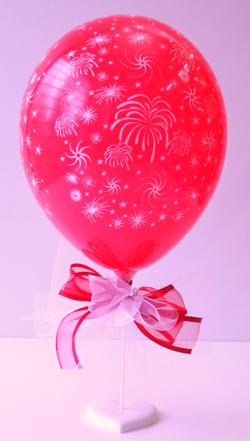 Ballondekoration Silvester, Tischdekoration aus Silvester-Feuerwerk-Luftballon, Tischständer mit Herz und Zierschleife